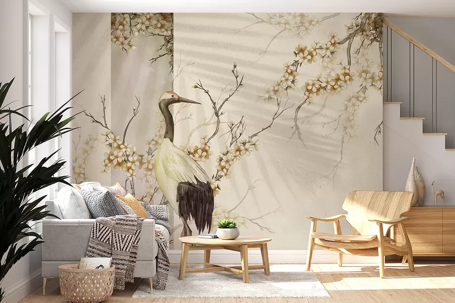 murales de pared Una grulla blanca parada sobre una rama con flores florecientes, contra un fondo suave y borroso w08159