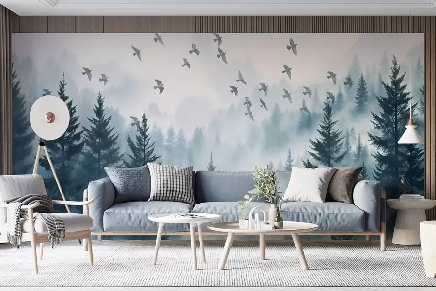 murales de pared Tranquilo bosque de niebla con árboles en tonos azules y bandadas de pájaros volando en el cielo  w08664